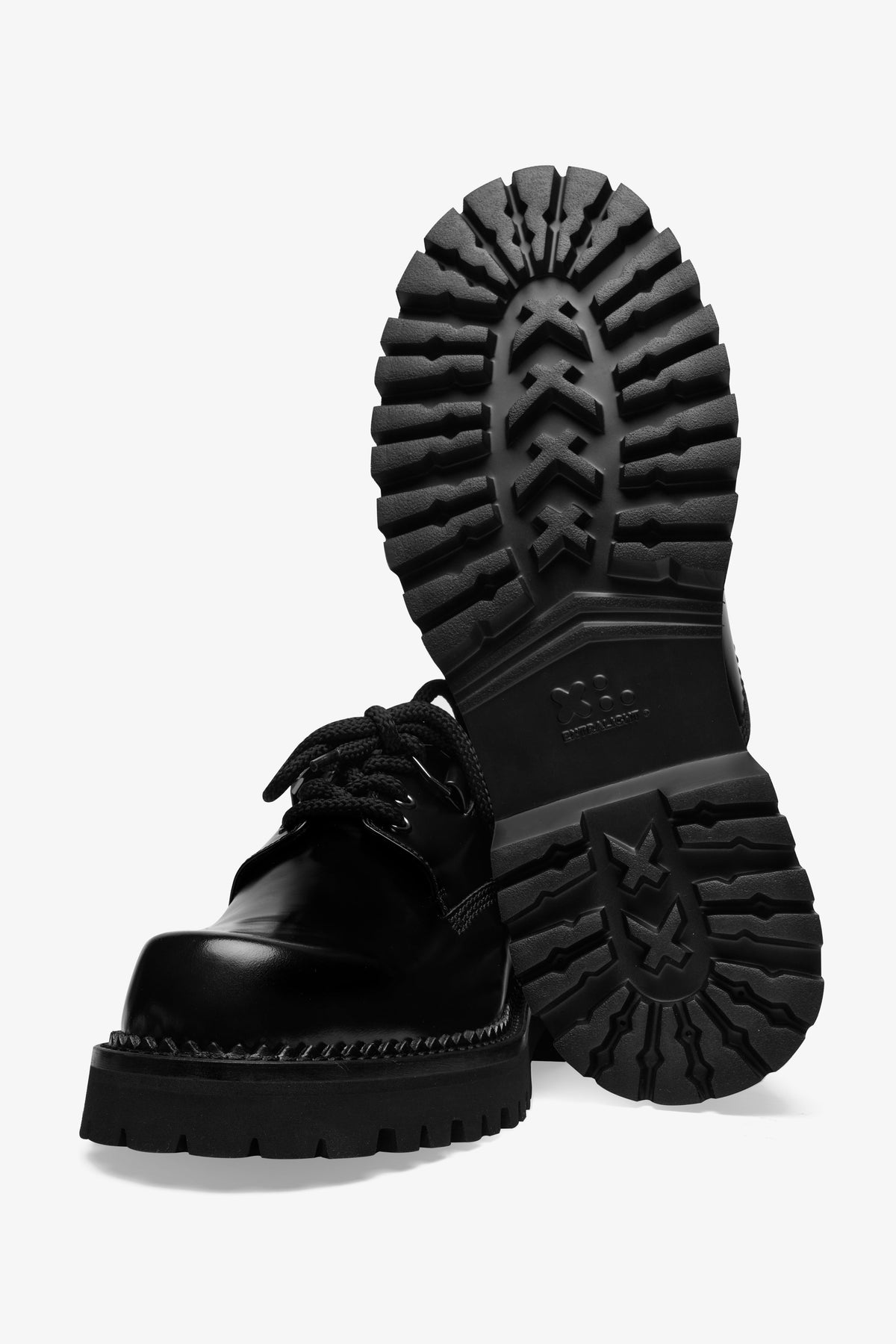 Curtis black leather derby shoe, front view with one shoe upright showing the outsole