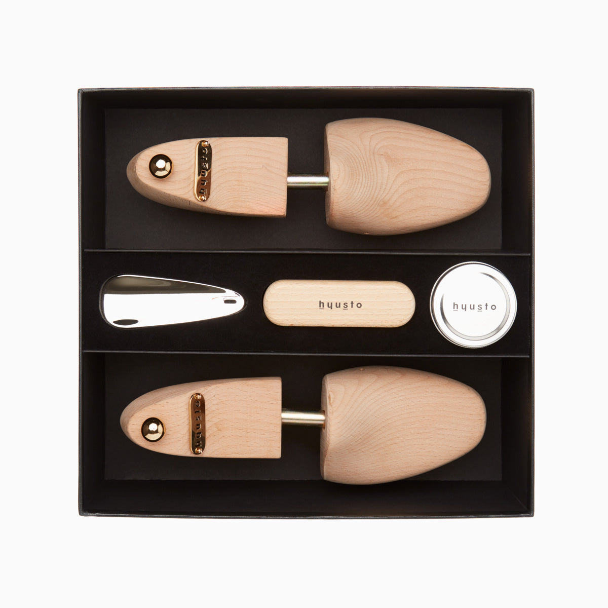 Hyusto Care and Maintenance box top view with Wood Last, shoehorn, brush and shoe cream 